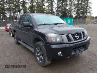 2012 Nissan Titan SV with VIN 1N6BA0EJ0CN303050, listed as a IAAI auction lot 41892370 with 120,018 mi miles. Bid and sale history available at carsss.com. Image 1.