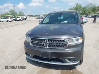 2014 Dodge Durango Citadel with VIN 1C4RDJEG0EC978611, listed as a IAAI auction lot 42250344 with 200,412 mi miles and . Bid and sale history available at DreamBid. Image 13.