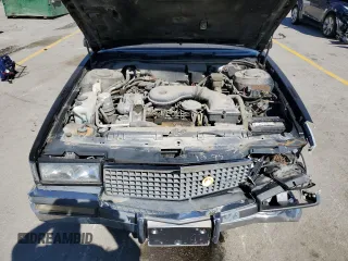 1989 Cadillac DeVille z VIN 1G6CD5151K4329443, wystawiony jako Copart lot #73939314 z przebiegiem 80 129 mil mil oraz Czysty tytuł • Clean title. Historia ofert i sprzedaży dostępna na DreamBid. Obrazek 11.