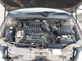 2003 Mercury Sable GS with VIN 1MEFM50U33A606937, listed as a IAAI auction lot 41058899 with 138,479 mi miles. Bid and sale history available at carsss.com. Image 10.