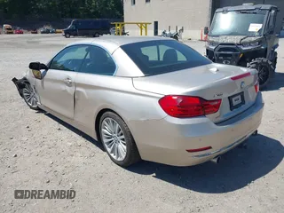 2015 BMW 4 Series 435i xDrive with VIN WBA3T7C51FP942320, listed as a IAAI auction lot 42584318 with 81,814 mi miles and . Bid and sale history available at DreamBid. Image 3.