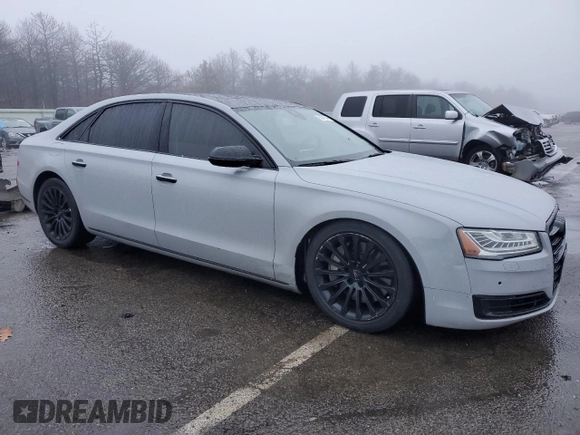 2016 Audi A8 3.0T z VIN WAU34AFD5GN014679, wystawiony jako Copart lot #86691744 z przebiegiem 119 422 mil mil oraz Szkoda całkowita • Salvage title. Historia ofert i sprzedaży dostępna na DreamBid. Obrazek 4.