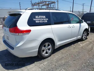 2011 Toyota Sienna LE AAS with VIN 5TDKK3DC3BS164612, listed as a IAAI auction lot 42302123 with 165,941 mi miles and . Bid and sale history available at DreamBid. Image 4.