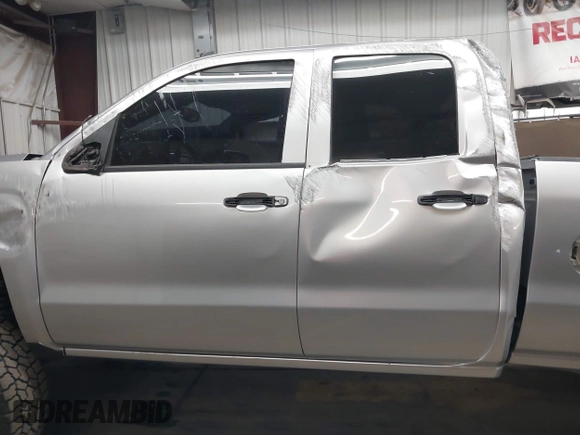 2018 Chevrolet Silverado 1500 LT with VIN 1GCVKREC1JZ151188, listed as a IAAI auction lot 42153618 with 82,391 mi miles and . Bid and sale history available at DreamBid. Image 15.