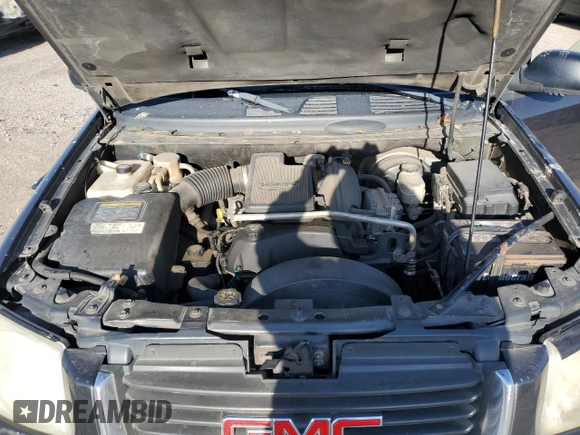 2004 GMC Envoy SLE with VIN 1GKDT13S042404250, listed as a Copart auction lot 52672455 with 230,610 mi miles and Salvage Title. Bid and sale history available at carsss.com. Image 13.