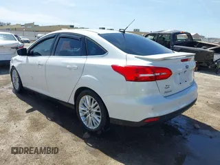2015 Ford Focus Titanium с VIN 1FADP3J27FL341102, выставлен на аукционе IAAI как лот 41793450 с пробегом 96 465 миль миль и . История ставок и продаж доступна на DreamBid. Изображение 3.