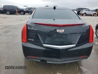 2015 Cadillac ATS Standard RWD z VIN 1G6AA5RA9F0143521, wystawiony jako Copart lot #82045854 z przebiegiem 106 089 mil mil oraz Szkoda całkowita • Salvage title. Historia ofert i sprzedaży dostępna na DreamBid. Obrazek 6.