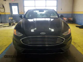 2020 Ford Fusion SE с VIN 3FA6P0HD5LR124658, выставлен на аукционе Copart как лот 58353795 с пробегом 66 258 миль миль и Списание • Salvage title. История ставок и продаж доступна на DreamBid. Изображение 5.