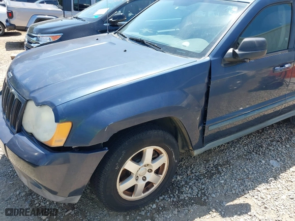 2009 Jeep Grand Cherokee Laredo with VIN 1J8GS48K79C539659, listed as a IAAI auction lot 42063431 with 1 mi miles. Bid and sale history available at carsss.com. Image 6.