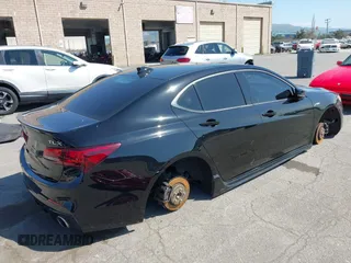 2018 Acura TLX w/A-SPEC Pkg with VIN 19UUB2F69JA007609, listed as a IAAI auction lot 41754437 with 195,047 mi miles. Bid and sale history available at carsss.com. Image 4.