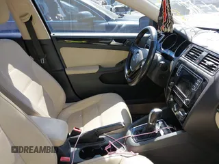 2016 Volkswagen Jetta Sedan 1.8T SEL with VIN 3VWL07AJ5GM263893, listed as a IAAI auction lot 41715603 with 188,778 mi miles. Bid and sale history available at carsss.com. Image 5.