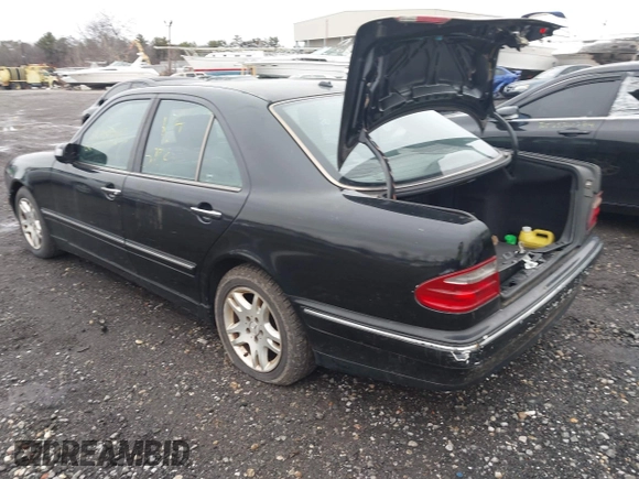2002 Mercedes-Benz E-Class with VIN WDBJF82J52X064244, listed as a IAAI auction lot 41819863 with 999,999 mi miles. Bid and sale history available at carsss.com. Image 3.