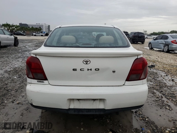 2002 Toyota ECHO with VIN JTDBT123X25021604, listed as a Copart auction lot 59541195 with Not provided miles and Salvage title. Bid and sale history available at DreamBid. Image 6.