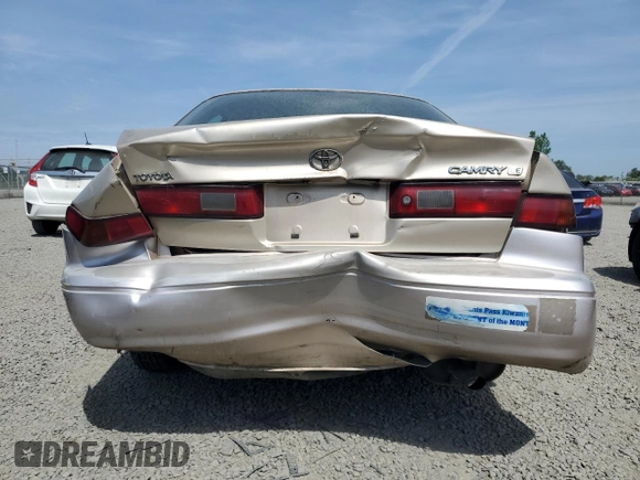 1999 Toyota Camry LE с VIN JT2BG22K6X0369818, выставлен на аукционе Copart как лот 54369385 с пробегом 246 320 миль миль и Списание • Salvage title. История ставок и продаж доступна на DreamBid. Изображение 6.