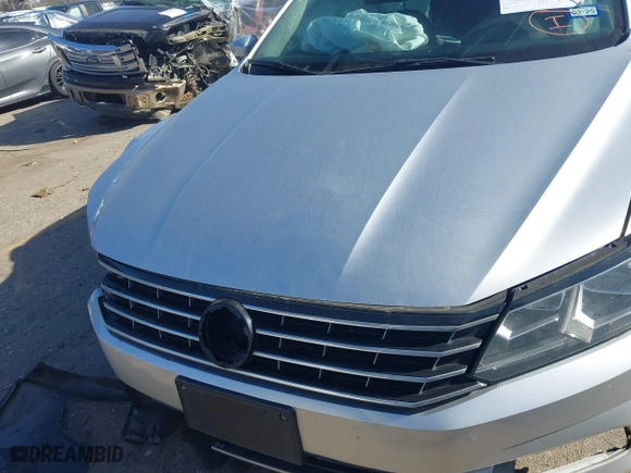 2016 Volkswagen Passat 1.8T S with VIN 1VWAS7A36GC032067, listed as a IAAI auction lot 41207782 with 123,651 mi miles. Bid and sale history available at carsss.com. Image 13.