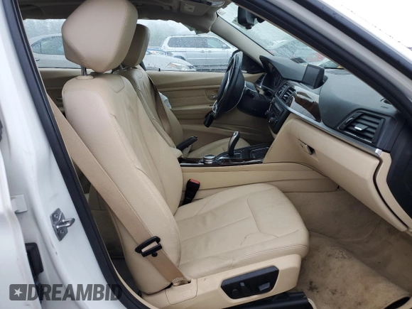 2014 BMW 3 Series 328i with VIN WBA3C1C50EK116423, listed as a Copart auction lot 61422515 with 166,006 mi miles and Salvage title. Bid and sale history available at DreamBid. Image 7.