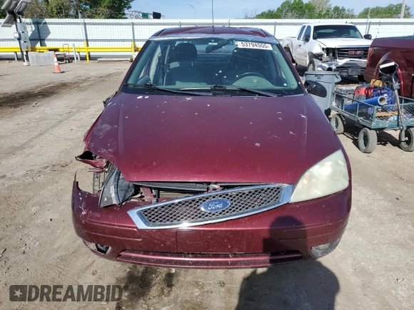 2006 Ford Focus S z VIN 1FAHP34N36W250236, wystawiony jako Copart lot #53794555 z przebiegiem 198 791 mil mil oraz Szkody całkowita. Historia ofert i sprzedaży dostępna na DreamBid. Obrazek 5.
