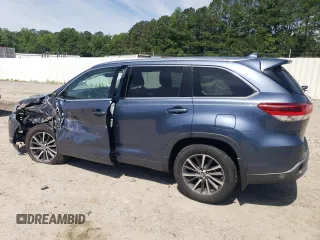 2017 Toyota Highlander XLE with VIN 5TDJZRFH7HS399459, listed as a Copart auction lot 57623325 with 141,568 mi miles and Salvage title. Bid and sale history available at DreamBid. Image 2.