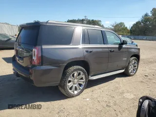 2015 GMC Yukon SLT with VIN 1GKS1BKC0FR239629, listed as a Copart auction lot 77414814 with 171,611 mi miles and Salvage Title. Bid and sale history available at carsss.com. Image 3.