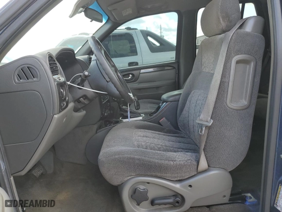 2004 GMC Envoy SLE with VIN 1GKDS13S342428948, listed as a Copart auction lot 52488385 with 292,426 mi miles and Salvage Title. Bid and sale history available at carsss.com. Image 7.