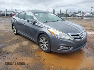 2013 Hyundai Azera with VIN KMHFG4JG7DA240540, listed as a IAAI auction lot 41816305 with 205,940 mi miles. Bid and sale history available at carsss.com. Image 1.