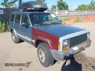 1999 Jeep Cherokee Sport z VIN 1J4FF68S7XL541101, wystawiony jako IAAI lot #42518775 z przebiegiem 213 762 mil mil oraz . Historia ofert i sprzedaży dostępna na DreamBid. Obrazek 1.