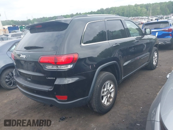 2020 Jeep Grand Cherokee Altitude with VIN 1C4RJEAG4LC337660, listed as a IAAI auction lot 42119646 with 92,780 mi miles and . Bid and sale history available at DreamBid. Image 4.