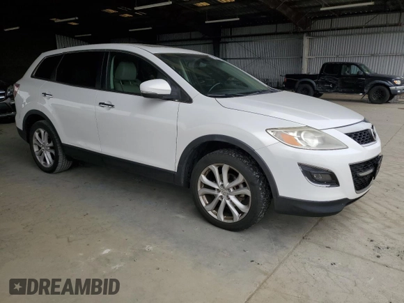 2012 Mazda CX-9 Grand Touring with VIN JM3TB3DV2C0336355, listed as a Copart auction lot 61687975 with 150,580 mi miles and Salvage title. Bid and sale history available at DreamBid. Image 4.