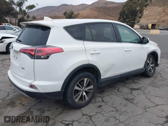 2018 Toyota RAV4 XLE with VIN JTMWFREV7JJ730811, listed as a IAAI auction lot 41075088 with 78,979 mi miles. Bid and sale history available at carsss.com. Image 4.