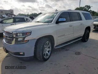 2015 Chevrolet Suburban LTZ with VIN 1GNSCKKC8FR511762, listed as a Copart auction lot 61952475 with 201,417 mi miles and Clean title. Bid and sale history available at DreamBid. Image 1.