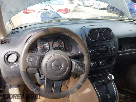 2013 Jeep Patriot Latitude with VIN 1C4NJPFA7DD213134, listed as a IAAI auction lot 41472480 with 176,068 mi miles. Bid and sale history available at carsss.com. Image 16.