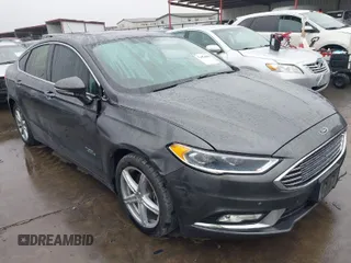 2017 Ford Fusion Energi SE with VIN 3FA6P0PU9HR414054, listed as a IAAI auction lot 41410580 with 88,257 mi miles. Bid and sale history available at carsss.com. Image 1.