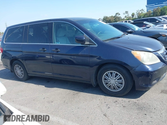 2008 Honda Odyssey LX with VIN 5FNRL38268B025424, listed as a IAAI auction lot 42432326 with 210,644 mi miles and . Bid and sale history available at DreamBid. Image 13.