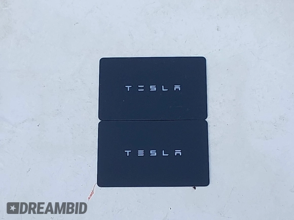 2019 Tesla Model 3 Long Range with VIN 5YJ3E1EBXKF512710, listed as a IAAI auction lot 42063737 with 90,721 mi miles and . Bid and sale history available at DreamBid. Image 11.