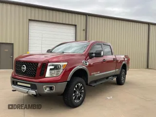 2016 Nissan Titan Pro-4X z VIN 1N6BA1F40GN516889, wystawiony jako Copart lot #72827234 z przebiegiem 123 706 mil mil oraz Czysty tytuł • Clean title. Historia ofert i sprzedaży dostępna na DreamBid. Obrazek 2.