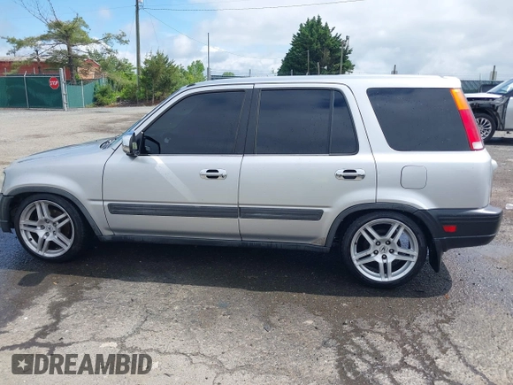 1997 Honda CR-V z VIN JHLRD1848VC057743, wystawiony jako IAAI lot #42259350 z przebiegiem 218 641 mil mil oraz . Historia ofert i sprzedaży dostępna na DreamBid. Obrazek 14.