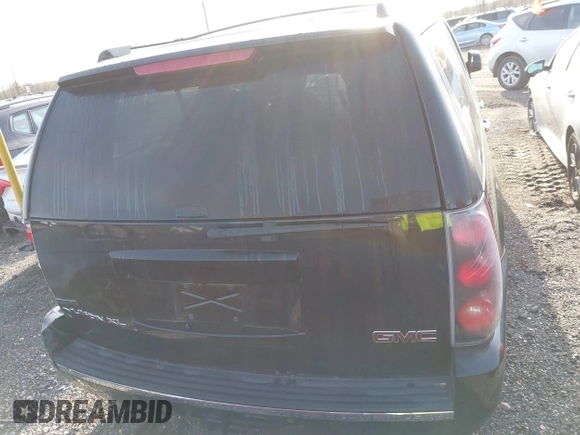 2011 GMC Yukon XL Denali with VIN 1GKS1MEF7BR271098, listed as a IAAI auction lot 42064073 with 218,601 mi miles. Bid and sale history available at carsss.com. Image 16.