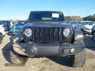 2021 Jeep Wrangler Sport S with VIN 1C4GJXAGXMW863259, listed as a IAAI auction lot 41399671 with 41,270 mi miles and . Bid and sale history available at DreamBid. Image 12.