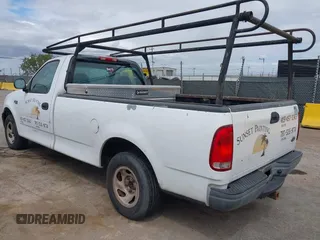 2002 Ford F-150 XL with VIN 1FTRF172X2KE34789, listed as a IAAI auction lot 42138397 with 188,960 mi miles and . Bid and sale history available at DreamBid. Image 3.