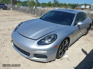 2014 Porsche Panamera S E-Hybrid with VIN WP0AD2A75EL044663, listed as a IAAI auction lot 41818381 with 44,194 mi miles. Bid and sale history available at carsss.com. Image 17.
