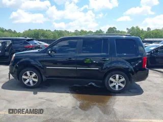 2013 Honda Pilot Touring z VIN 5FNYF3H98DB023104, wystawiony jako IAAI lot #42310538 z przebiegiem 169 385 mil mil oraz . Historia ofert i sprzedaży dostępna na DreamBid. Obrazek 14.