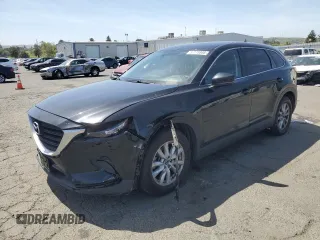 2017 Mazda CX-9 Sport z VIN JM3TCABY6H0131479, wystawiony jako Copart lot #57178805 z przebiegiem 98 698 mil mil oraz Szkoda całkowita • Salvage title. Historia ofert i sprzedaży dostępna na DreamBid. Obrazek 1.