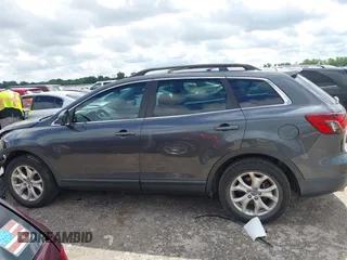 2015 Mazda CX-9 Touring with VIN JM3TB2CA7F0460232, listed as a IAAI auction lot 42344122 with 103,478 mi miles and . Bid and sale history available at DreamBid. Image 15.