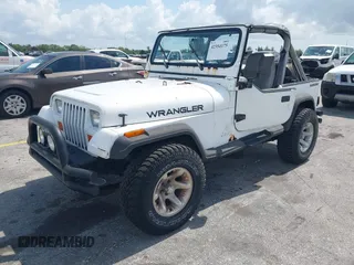 1990 Jeep Wrangler with VIN 2J4FY29T7LJ528844, listed as a IAAI auction lot 42354175 with 69,349 mi miles and . Bid and sale history available at DreamBid. Image 2.
