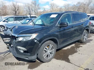 2016 Honda Pilot EX-L with VIN 5FNYF6H53GB048317, listed as a IAAI auction lot 41826297 with 127,672 mi miles. Bid and sale history available at carsss.com. Image 2.