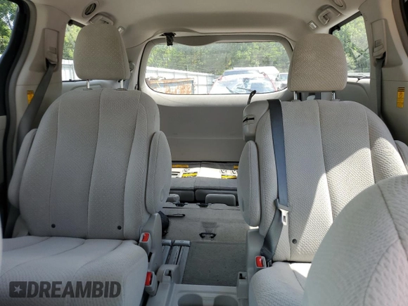 2014 Toyota Sienna LE AAS z VIN 5TDKK3DC8ES499949, wystawiony jako Copart lot #60346845 z przebiegiem 192 773 mil mil oraz Szkoda całkowita • Salvage title. Historia ofert i sprzedaży dostępna na DreamBid. Obrazek 10.