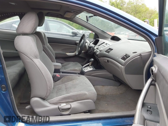 2006 Honda Civic Cpe EX with VIN 2HGFG12826H560333, listed as a IAAI auction lot 42131156 with 182,438 mi miles. Bid and sale history available at carsss.com. Image 5.