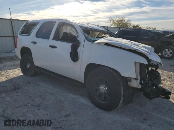 2014 Chevrolet Tahoe Commercial z VIN 1GNLC2E06ER212372, wystawiony jako Copart lot #82332554 z przebiegiem Nie podano mil oraz Szkoda całkowita • Salvage title. Historia ofert i sprzedaży dostępna na DreamBid. Obrazek 4.