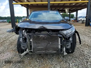 2021 Toyota RAV4 XLE Premium with VIN 2T3C1RFV9MC109917, listed as a Copart auction lot 58594335 with 64,995 mi miles and Salvage title. Bid and sale history available at DreamBid. Image 5.