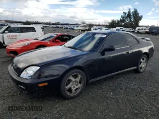 2000 Honda Prelude with VIN JHMBB6144YC007274, listed as a Copart auction lot 85072464 with 176,860 mi miles and Salvage Title. Bid and sale history available at DreamBid. Image 1.